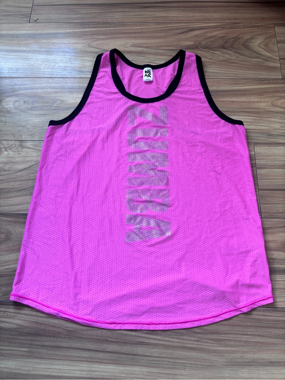 Zumba Wear pink mesh tank top with vertical 'ZUMBA' text in size L